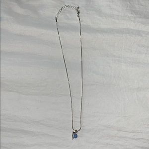 silver dolphin with blue pearl necklace